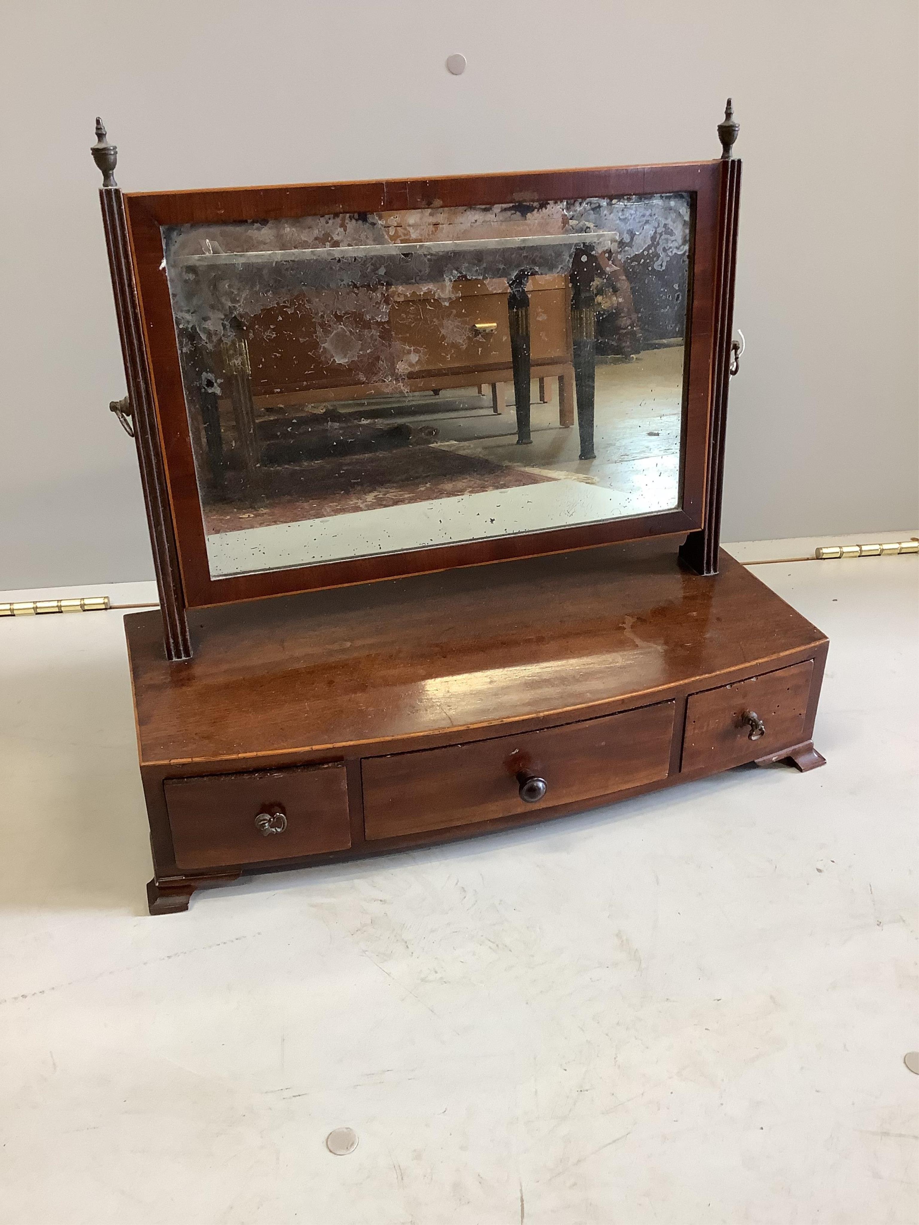 A George III mahogany box base bow front toilet mirror, width 47cm, depth 22cm, height 44cm. Condition - fair